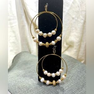 Gold Double Hoops With Randals and Fresh Water Pearls. The weight is 15.…